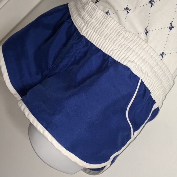 5/$25 Blue dolphin shorts white trim and with pockets - Picture 3 of 5